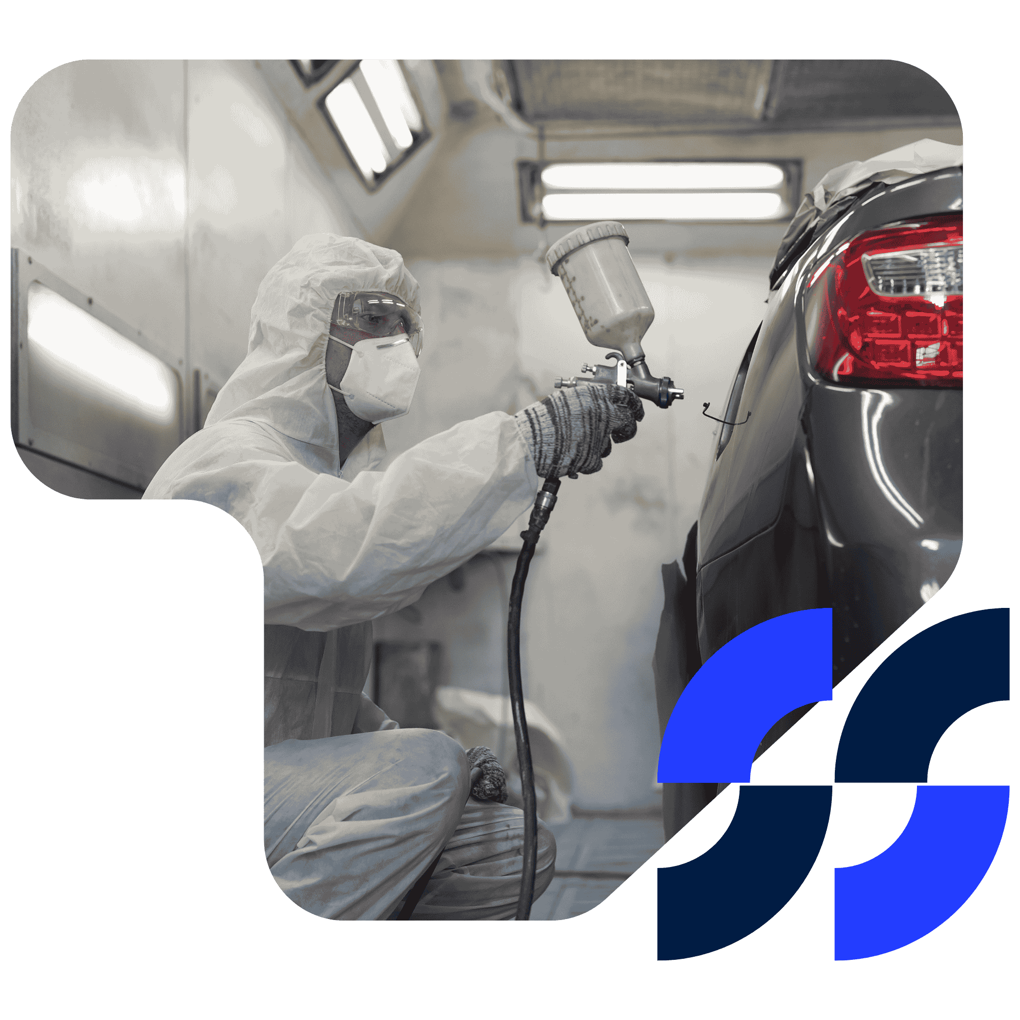 A professional automotive spray painter in protective gear applying a spray paint coat to a vehicle in a workshop.